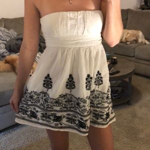 Strapless white dress with black detailing